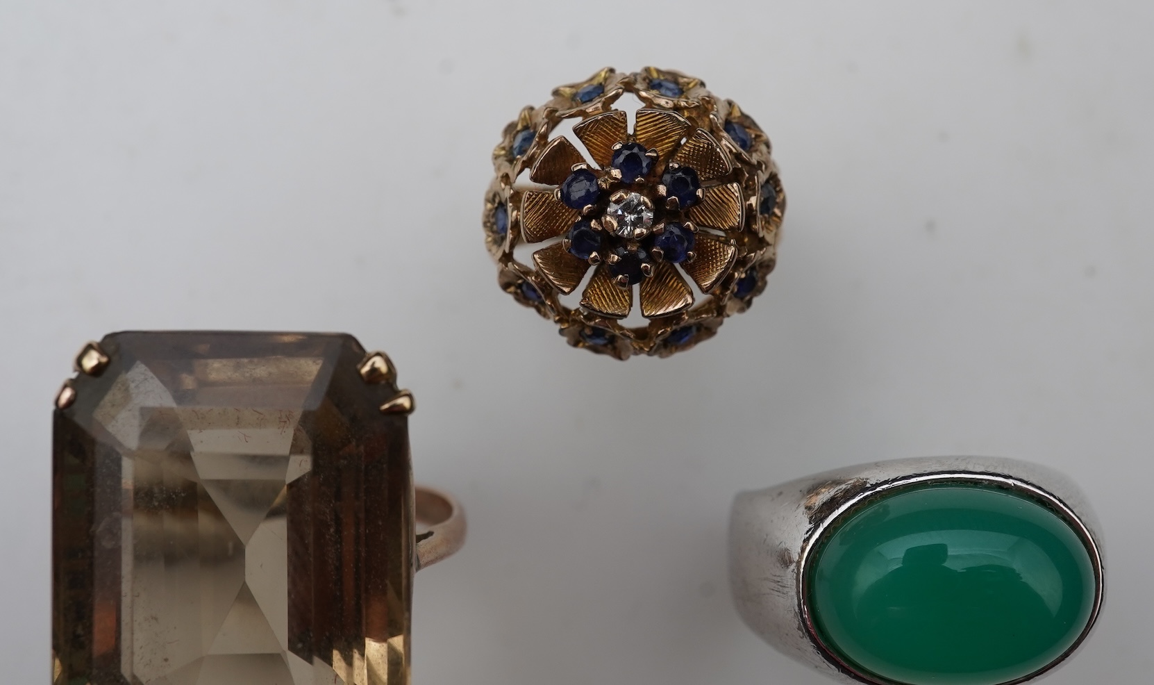 Three gem-set dress rings